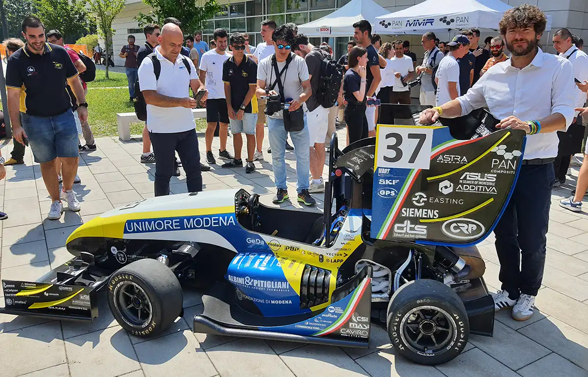Professor Matteo Giacopini, Faculty Advisor “Automotive Learning by Doing” project, with the M24-LH prototype